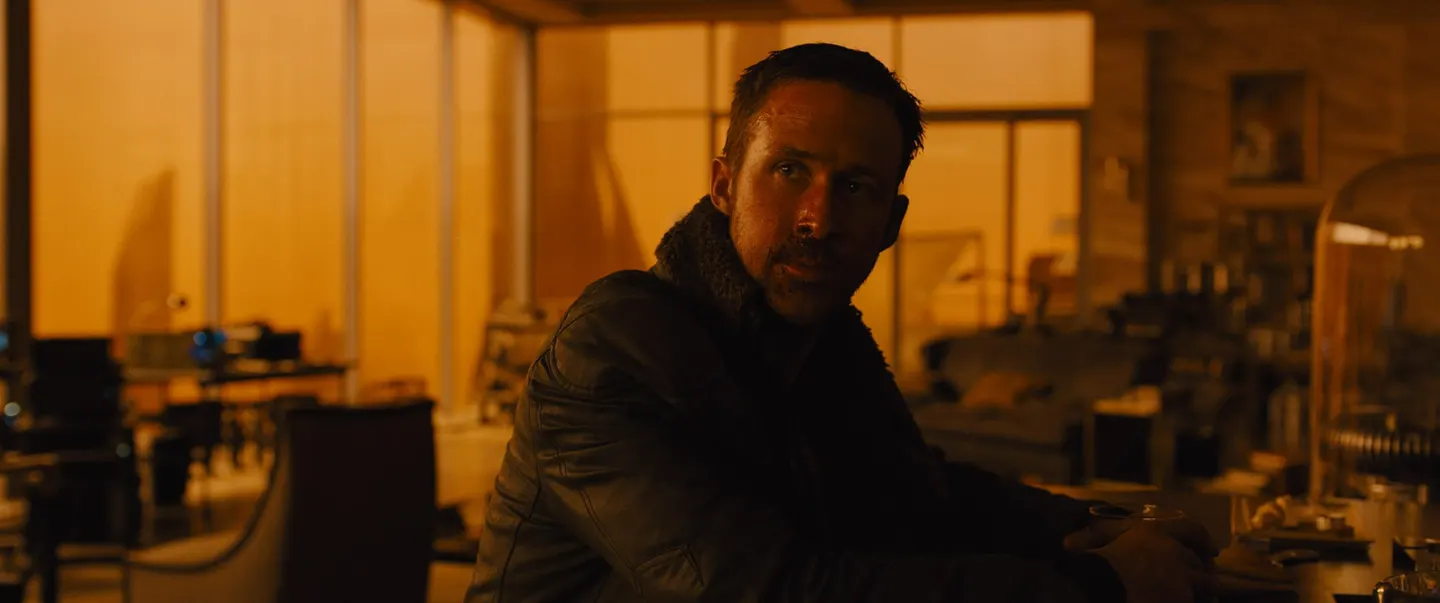 A neon-lit cityscape evoking the synthetic memory themes of Blade Runner 2049